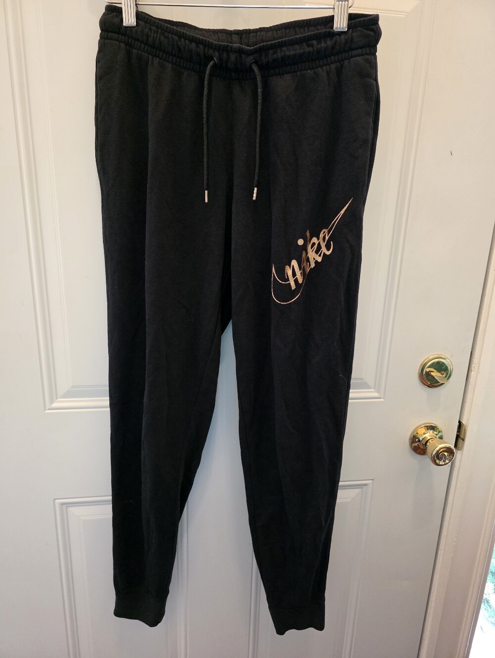 Women's Nike Black Joggers with Gold Swoosh Size Small